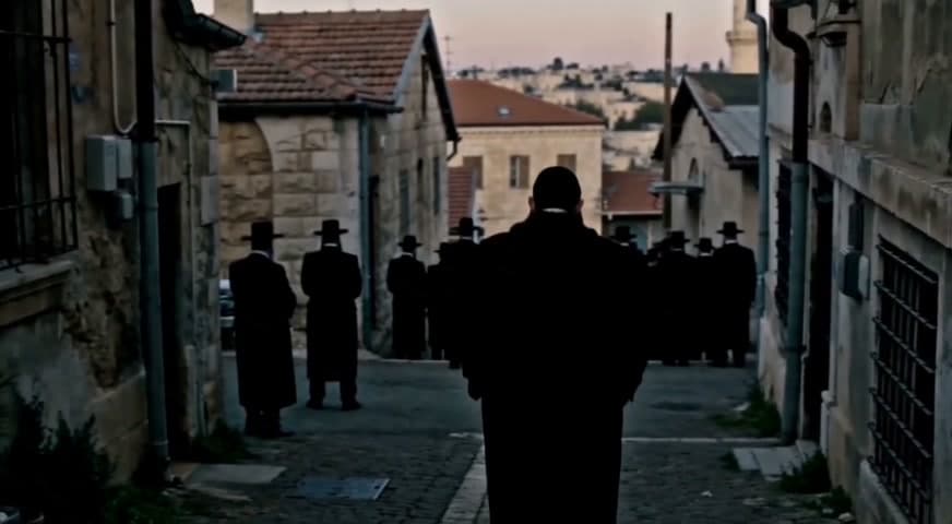 The protagonist walking home through Jerusalem’s ancient streets